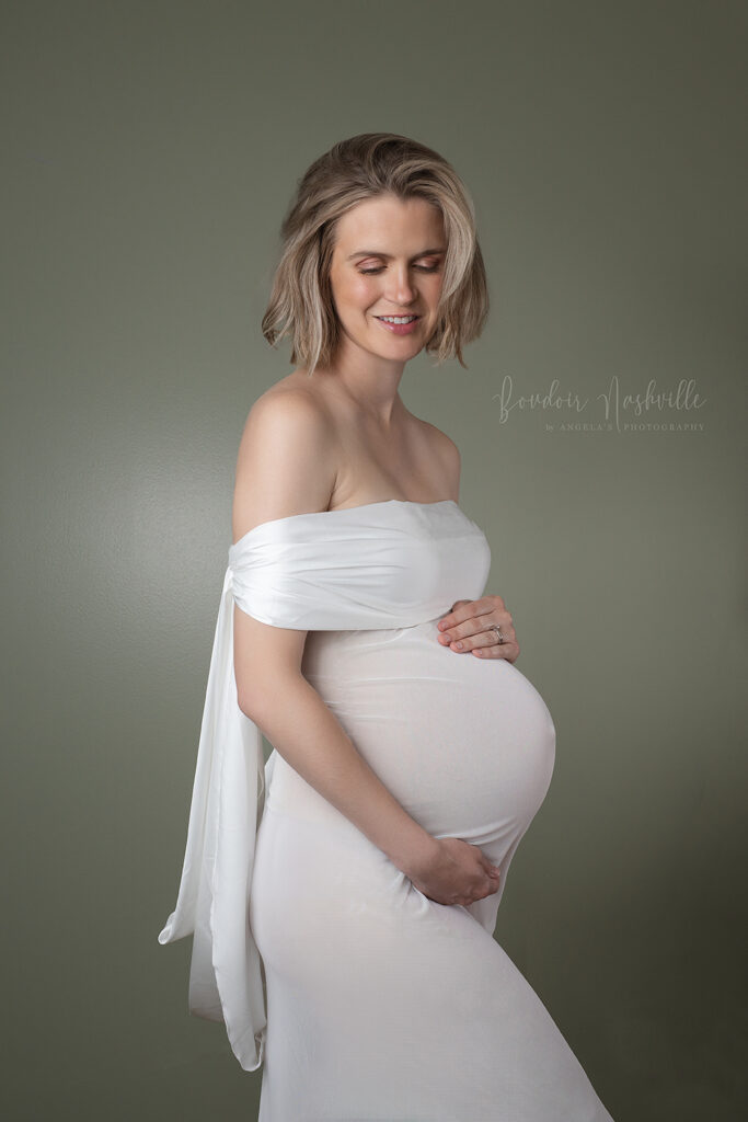 Beautiful and elegant white maternity gown.